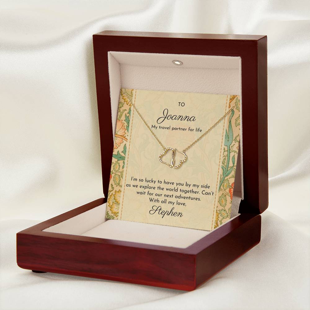 Double hearts solid gold necklace shown with message card featuring William Morris 'Pink and rose' design - shown in luxury mahogany-style gift box with LED light