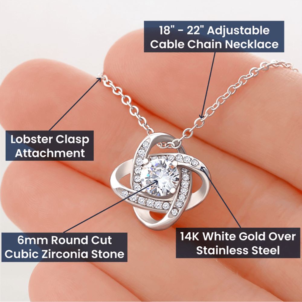 Diagram showing specifications of friendship knot necklace - lobster clasp, adjustable chain length, 14k white gold finish over stainless steel and 6mm cubic zirconia stone