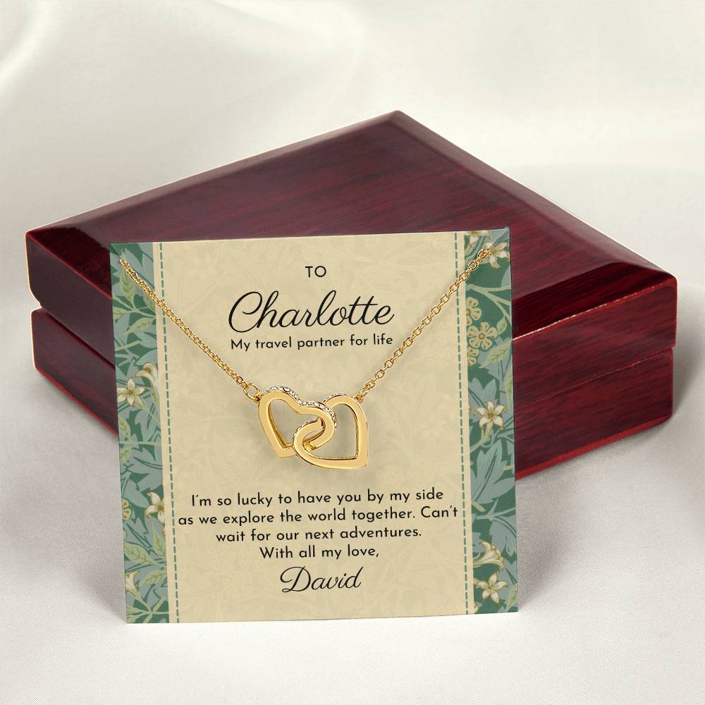 Entwined hearts necklace shown with William Morris 'Jasmine' patterned message card and luxury mahogany-style box