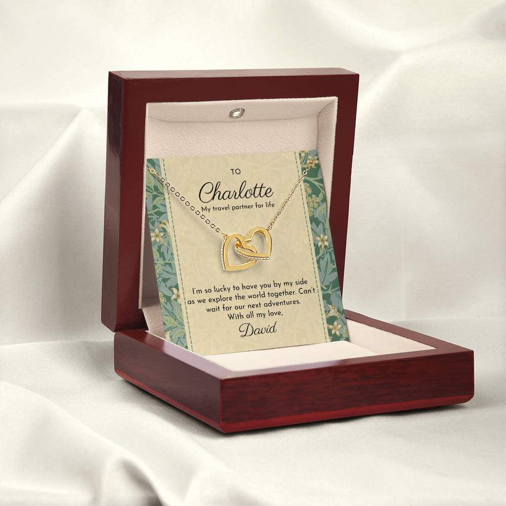 Entwined hearts necklace shown with William Morris 'Jasmine' patterned message card and luxury mahogany-style box