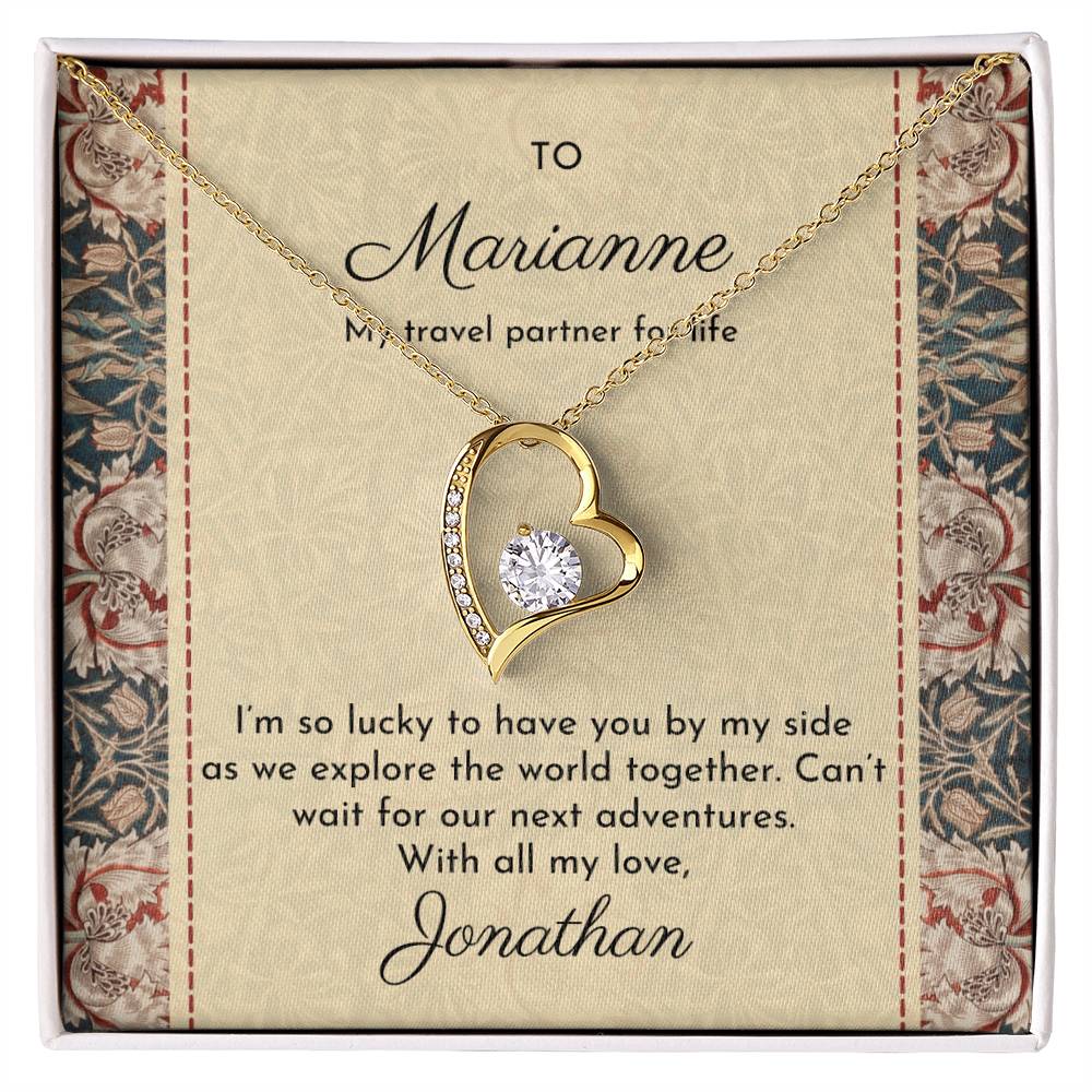 Gold dipped sparkling heart necklace shown in standard gift box with William Morris 'honeysuckle' design on message card