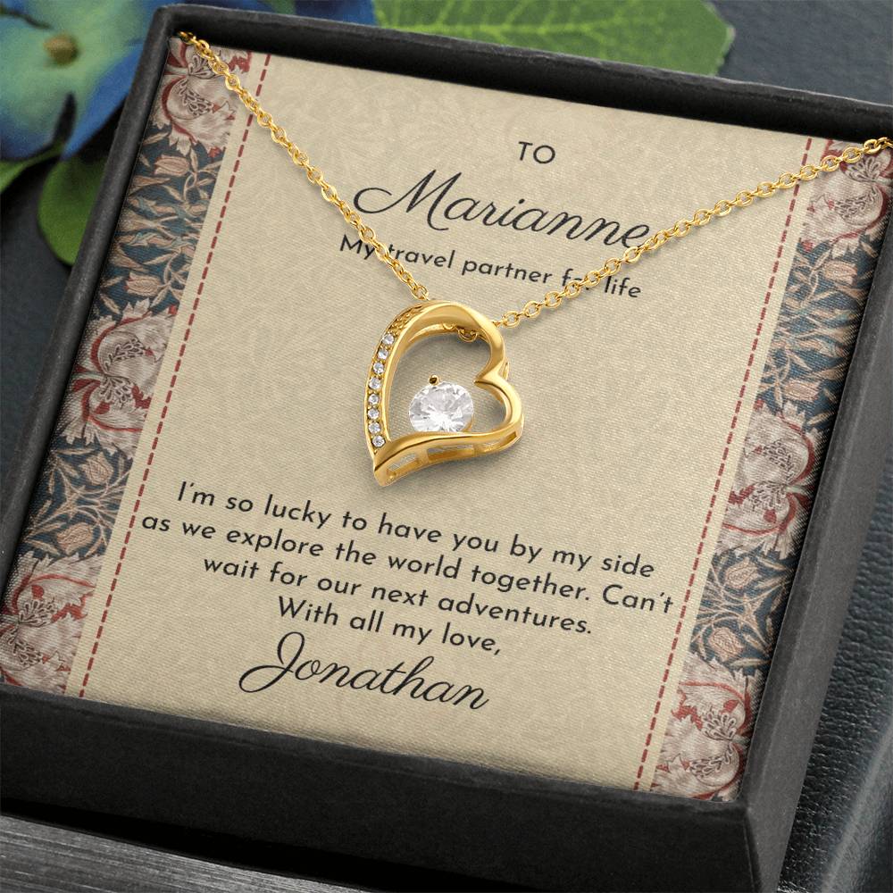 Gold dipped sparkling heart necklace shown in standard gift box with William Morris 'honeysuckle' design on message card